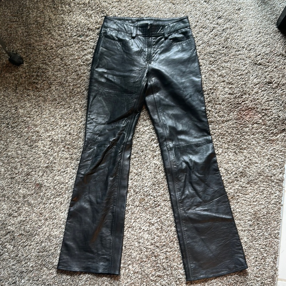 Women’s black leather Banana Republic pants.